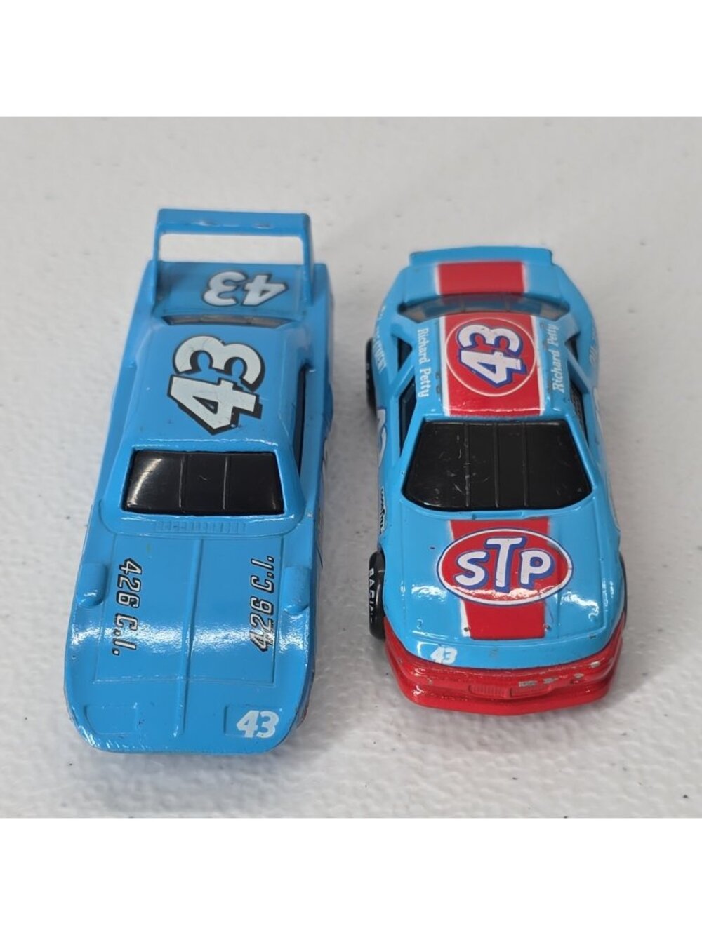 1991 Richard Petty #43 STP Racing Champions Die Cast 1/43 & Plymouth By Petty